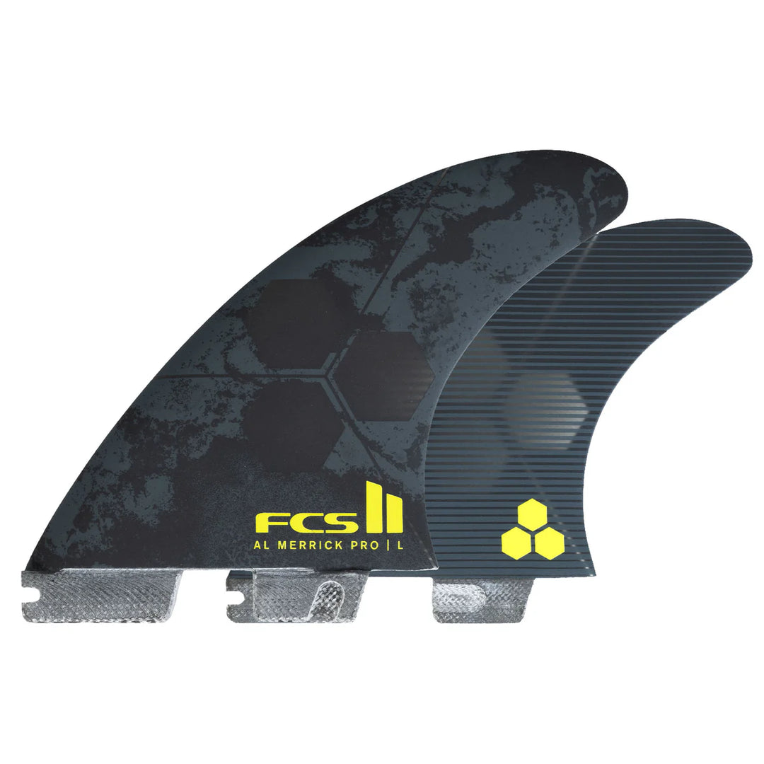 Two surfboard fins with FCS II branding on a white background