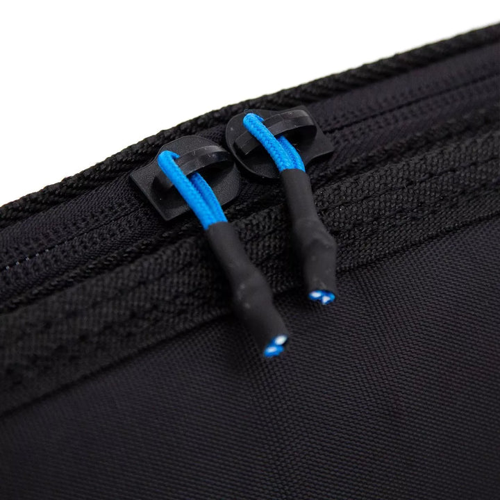 Close-up of a black zipped surfboard bag with blue zip toggles on a white background