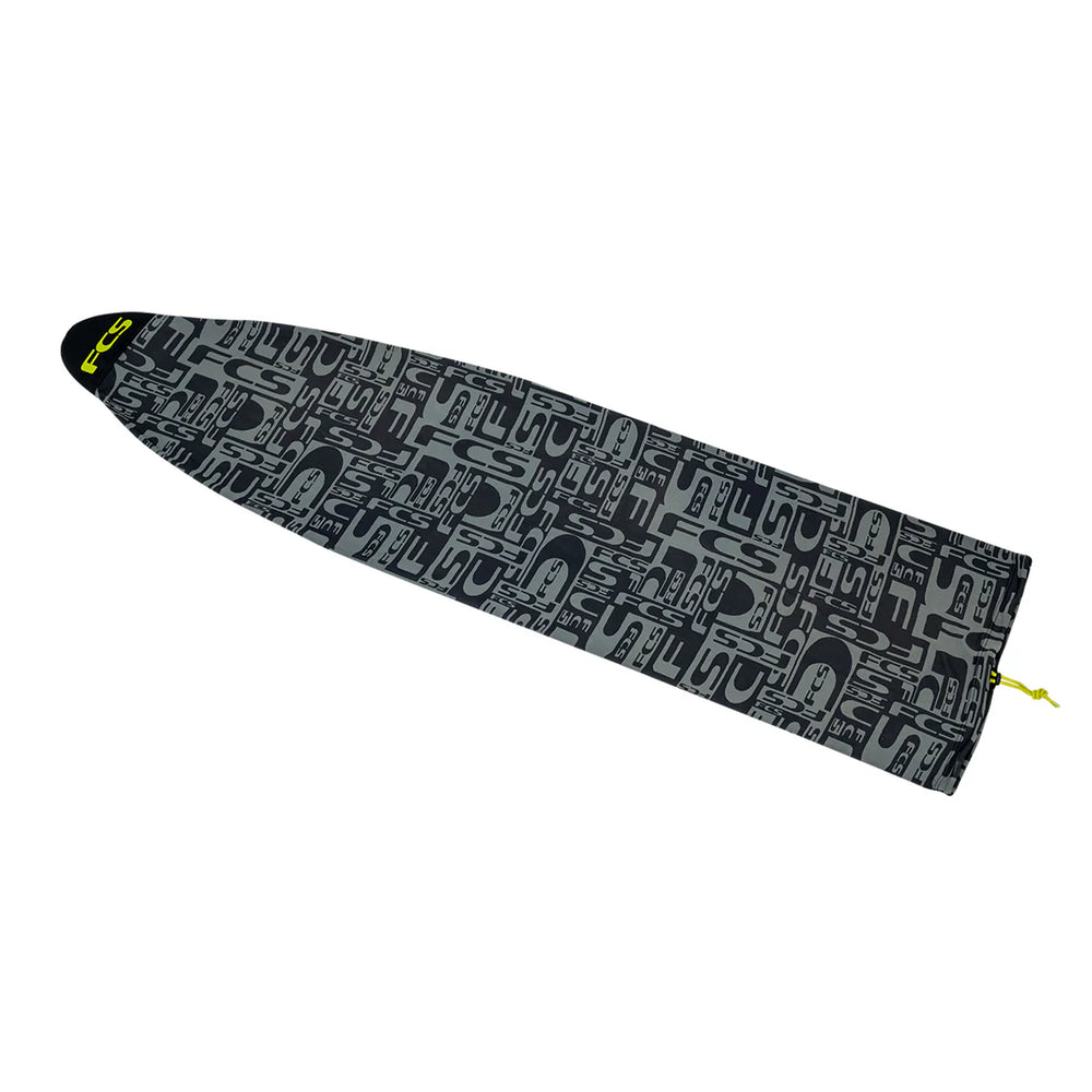 Black and grey patterned surfboard cover with a lime-coloured FCS logo on a white background