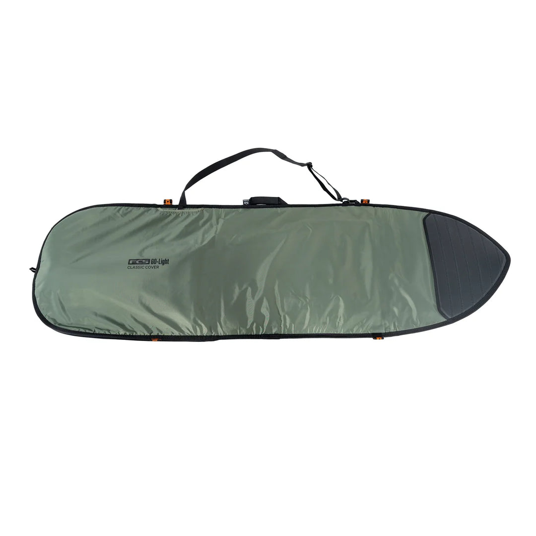 Side profile of a green FCS Go-Lite surfboard bag, showing handle and strap.