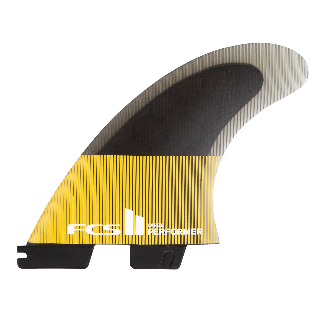 Yellow and black surf fin with FCS branding on a white background