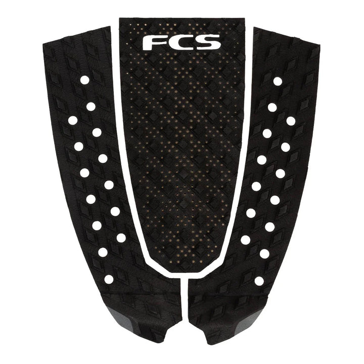 Black FCS surfboard tail pad on a white background