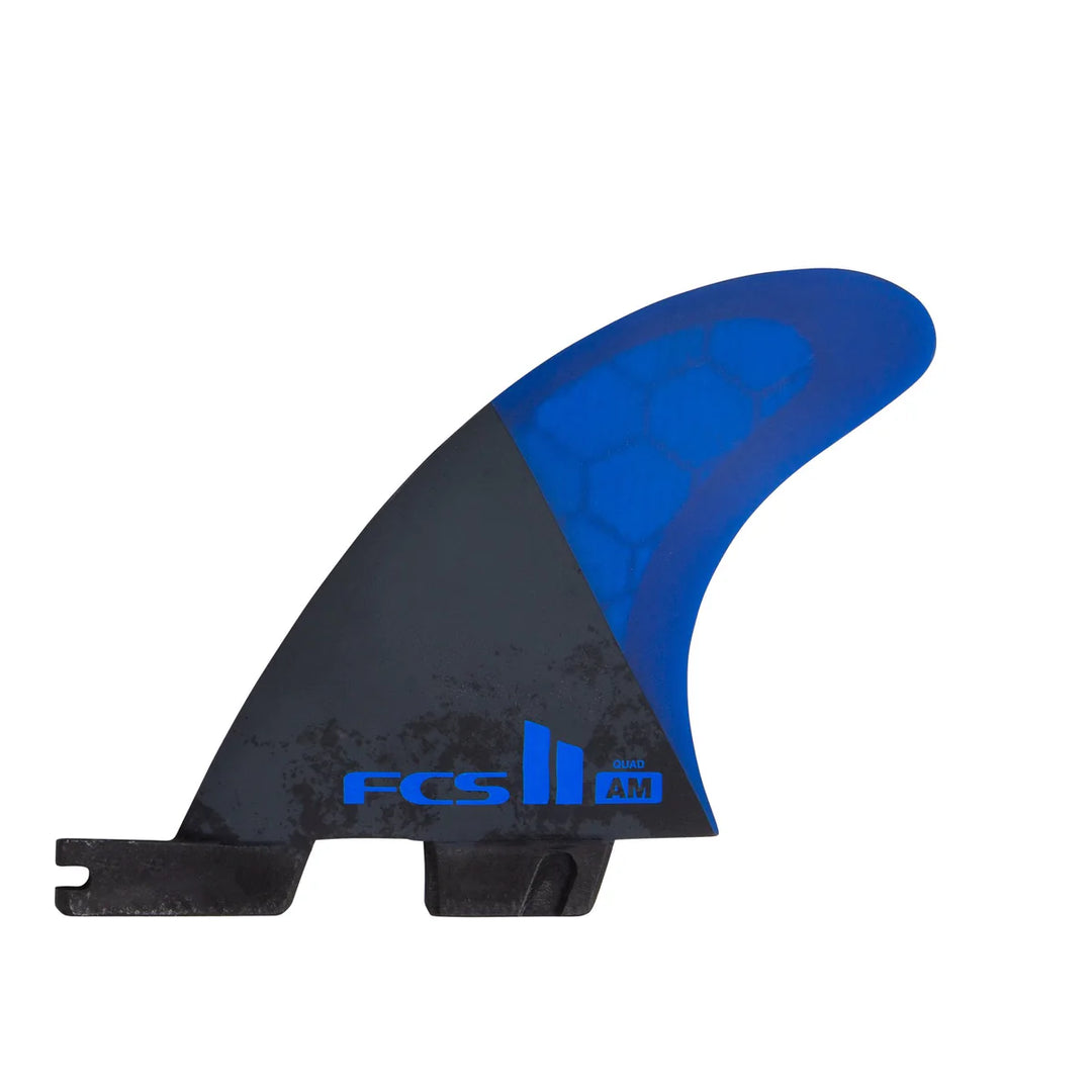 Blue and black surf fin with FCS II branding on a white background