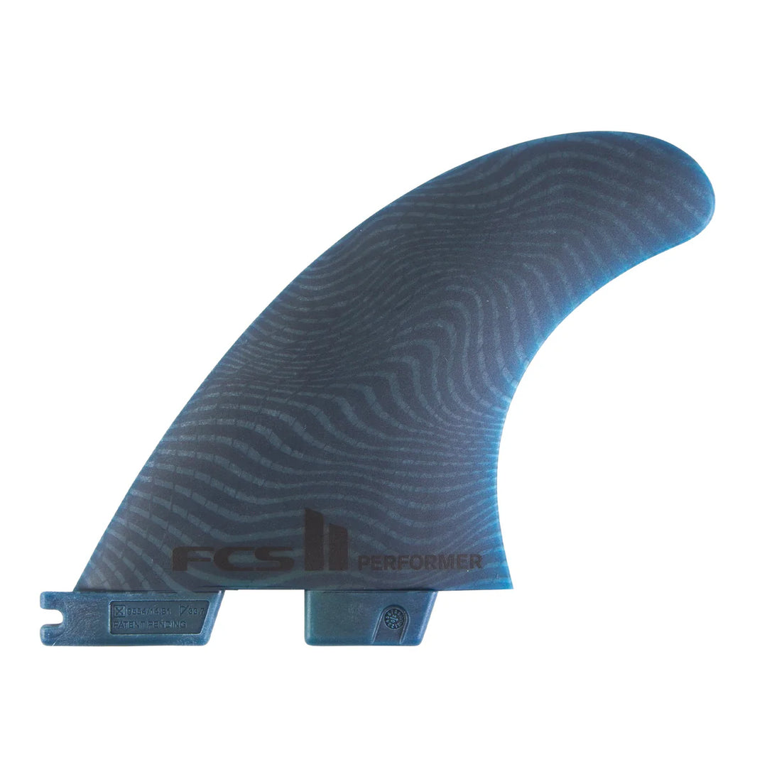 Blue textured surfboard fin with FCS II branding on a white background
