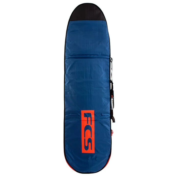 Blue surfboard bag with red FCS logo on a white background