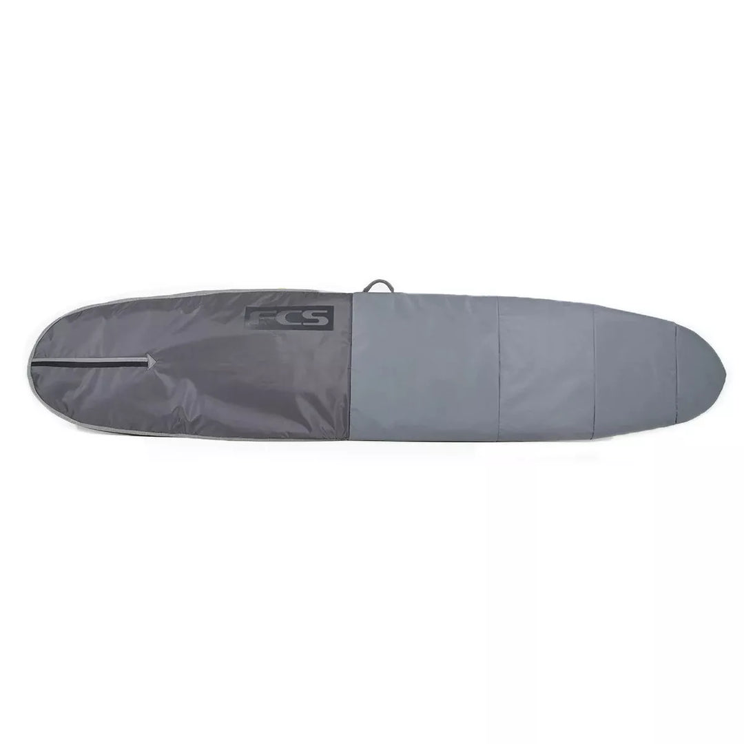 Grey surfboard bag with a FCS logo on a white background