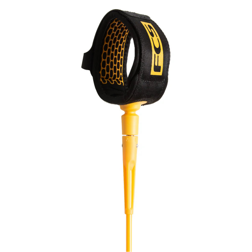 Black and yellow surfboard leash on a white background
