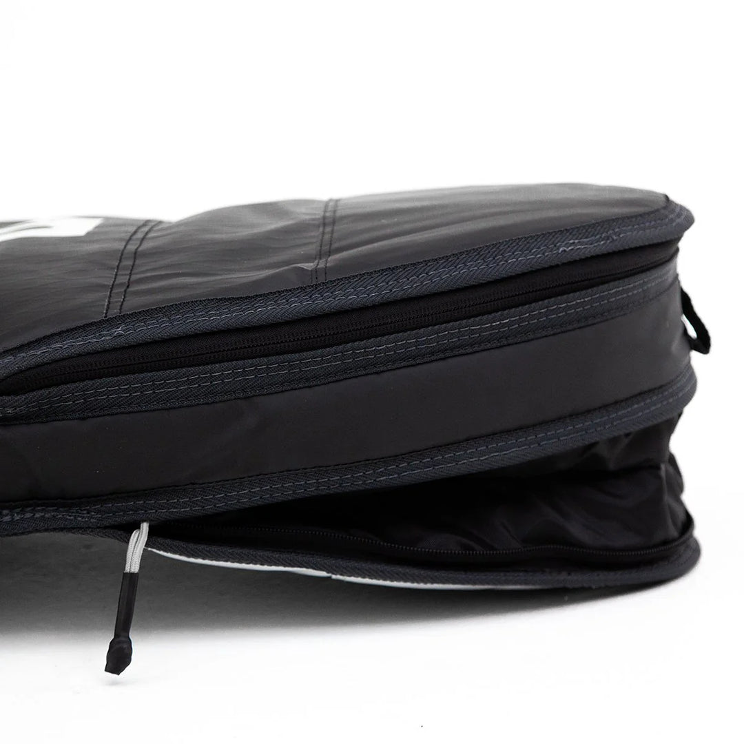 Black FCS board bag with a visible brand logo on a white background