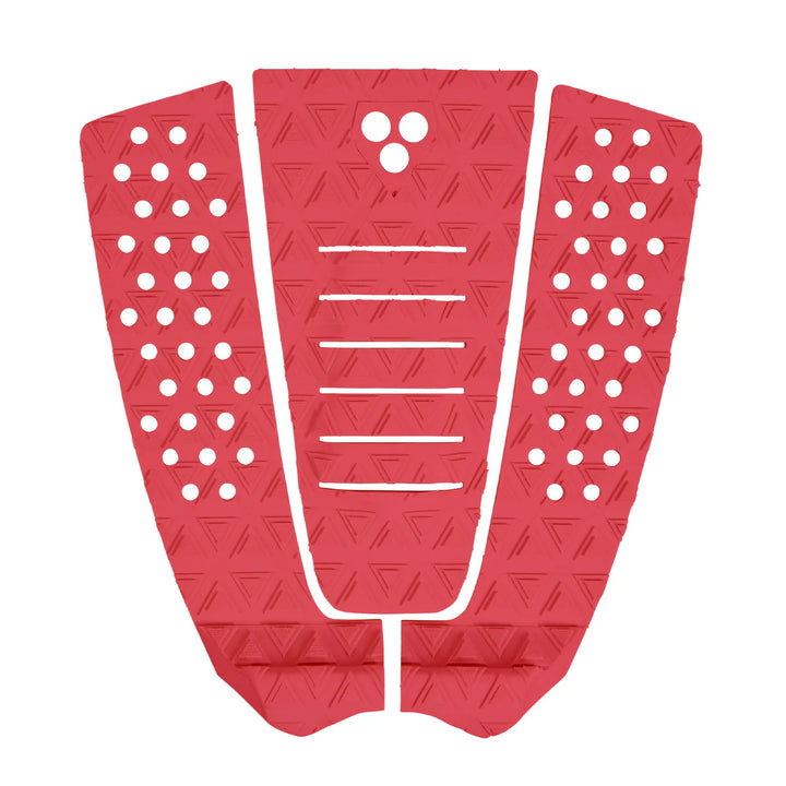 Red textured surfboard tail pad with geometric pattern on a white background