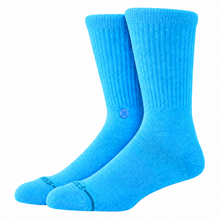 A pair of bright blue socks on a transparent background.