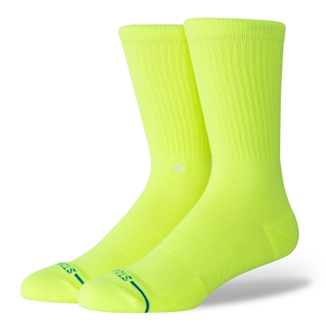 A pair of fluorescent yellow socks on a transparent background