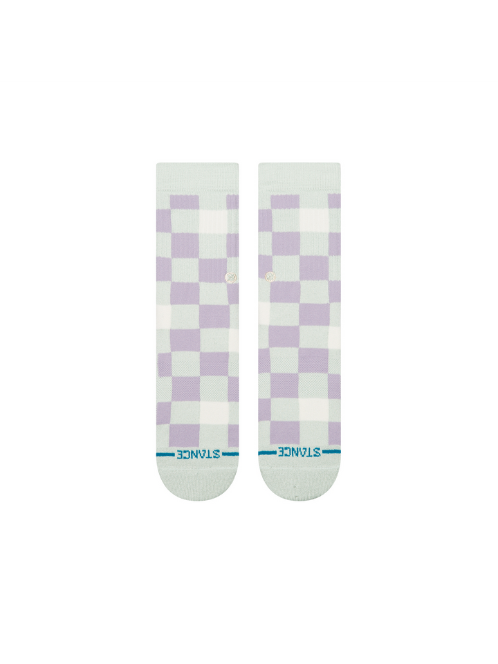 A pair of Stance crew socks with a lavender and white checkerboard pattern on the upper half and a light mint green toe and heel section. The brand name &