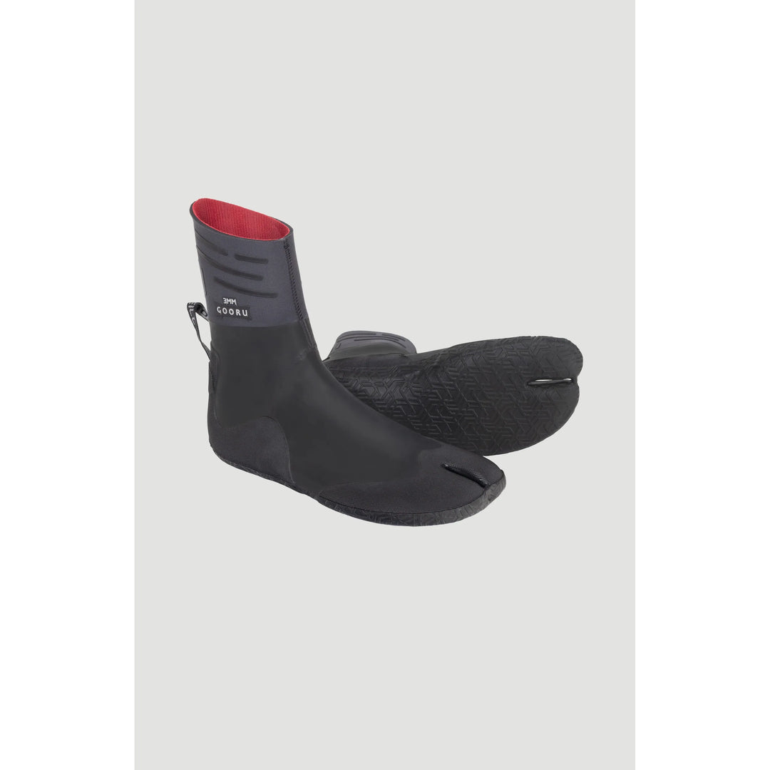 Black wetsuit boots with red interior on a light grey background