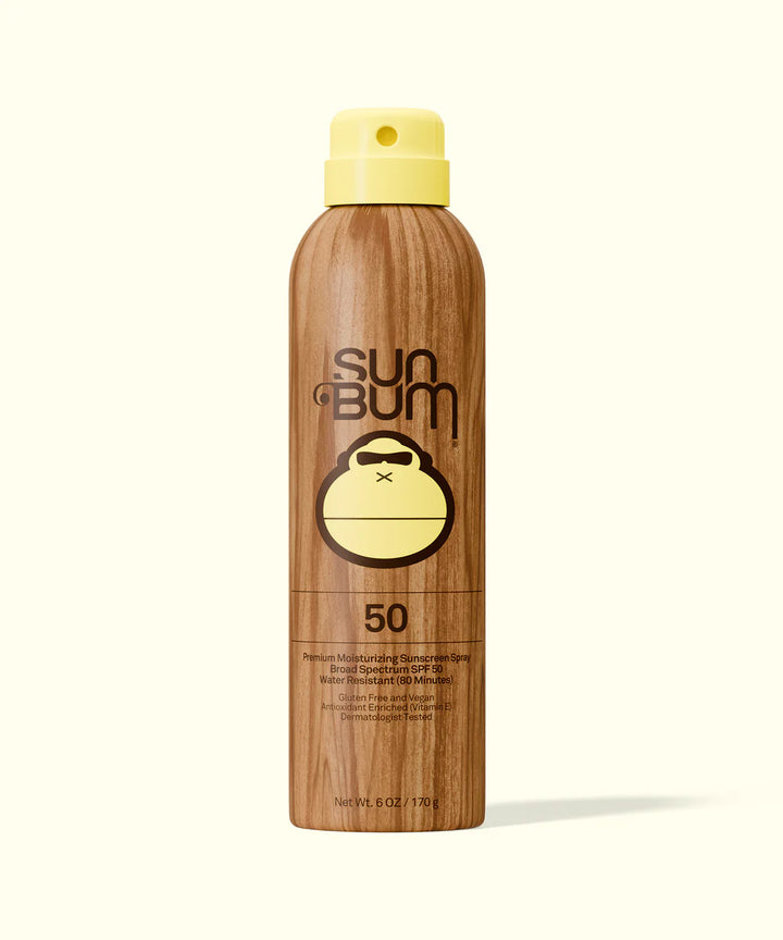 Wooden sunscreen bottle with yellow cap and &