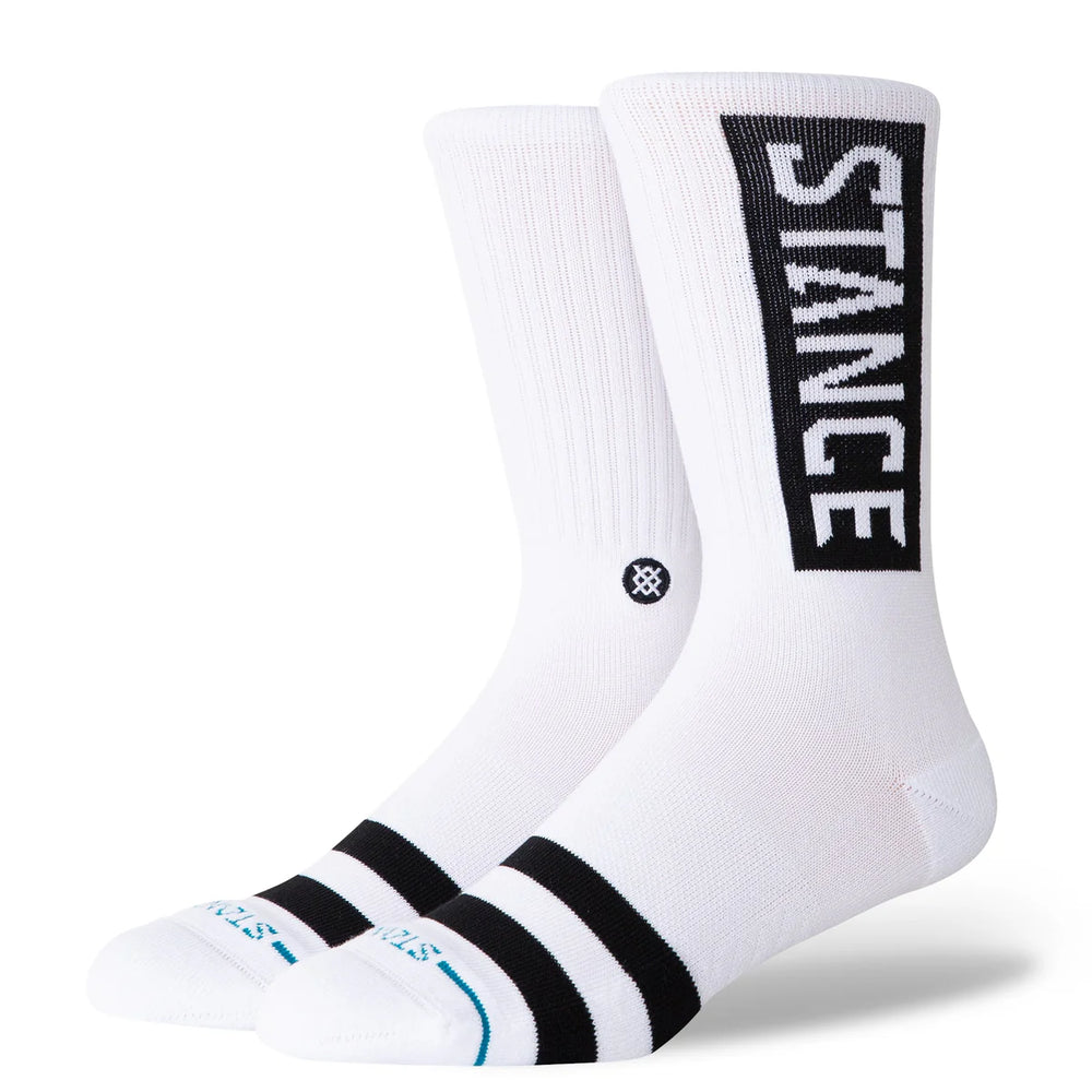 White socks with black and blue accents and 'STANCE' logo on a white background