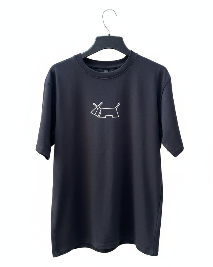 A black short-sleeve t-shirt hanging on a black hanger against a plain white background. The shirt features a small white line-art graphic of a dog on the center chest.