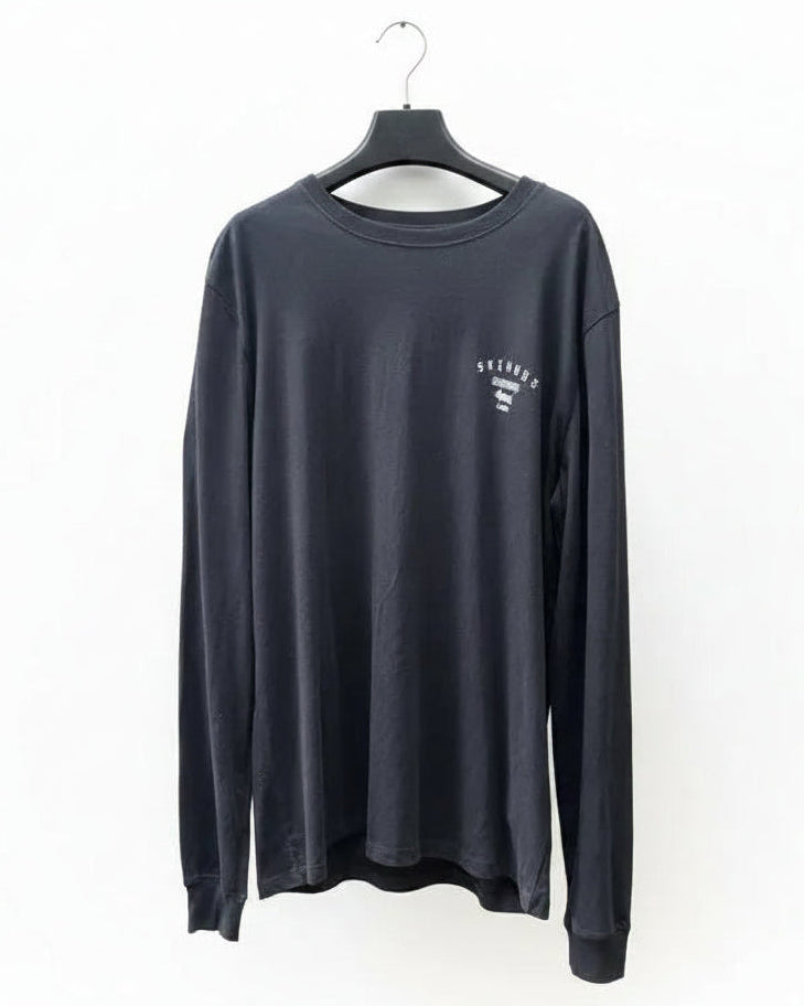 Black long-sleeve shirt with a white Skindog chest logo on a hanger against a white background
