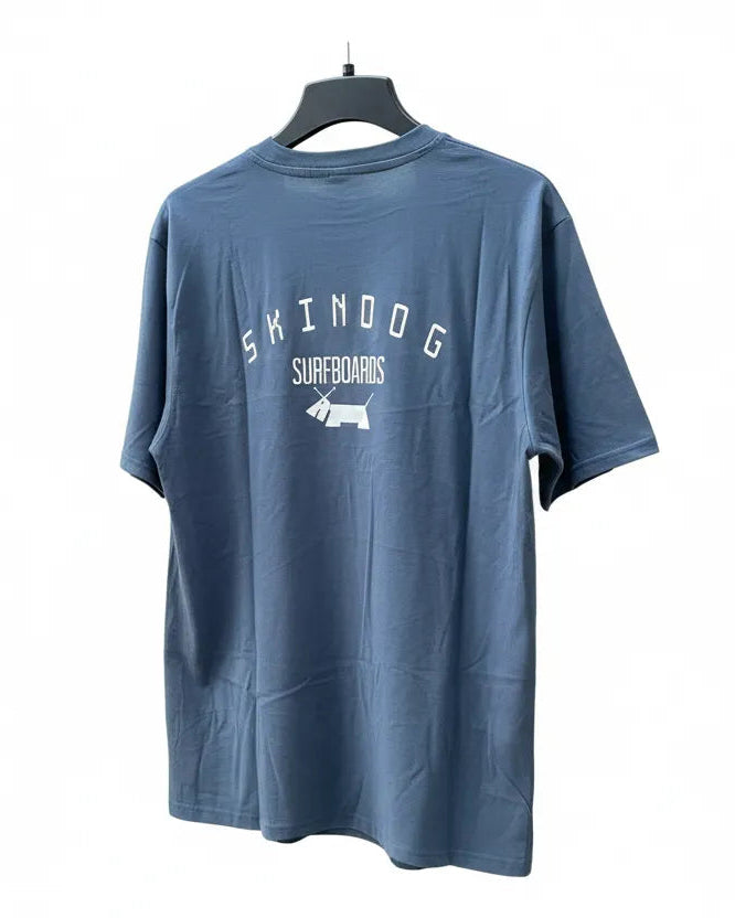 Blue t-shirt with 'Skindoog Surfboards' logo on a white background