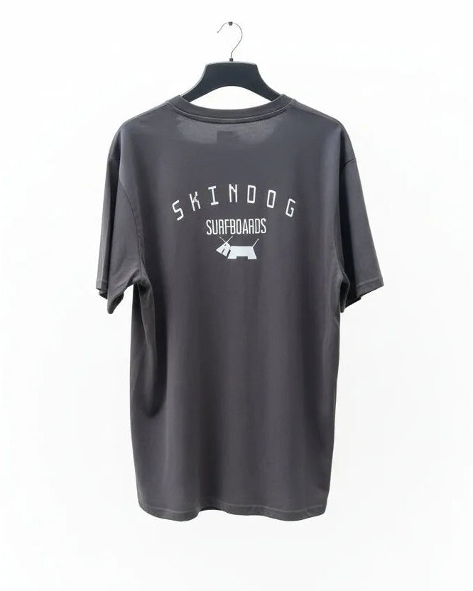 Black t-shirt with 'Skindog Surfboards' logo on a white background