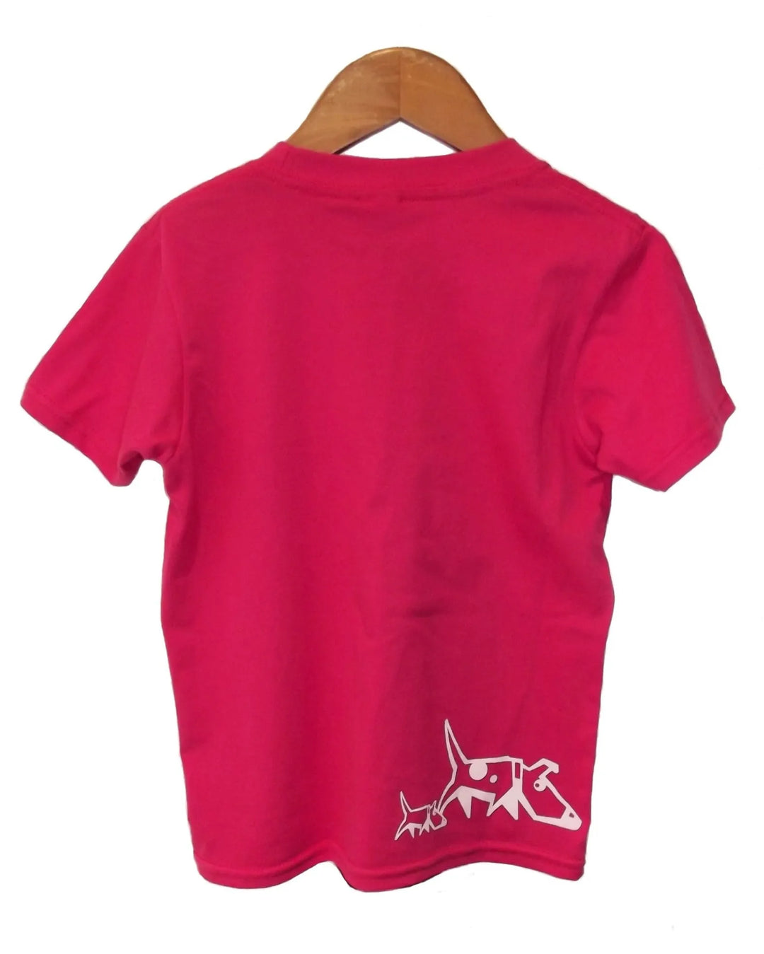 Pink t-shirt with a white dog graphic on a wooden hanger against a white background