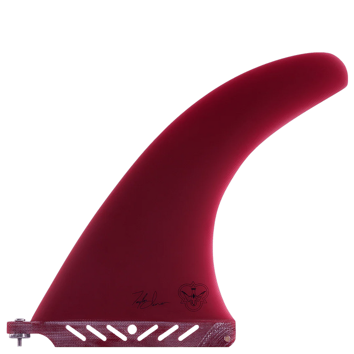 Red surfboard fin with branding on a white background
