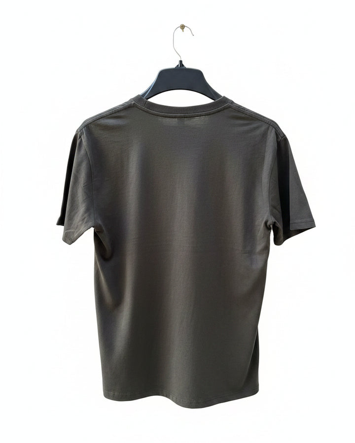 Black t-shirt on a hanger with a white background.