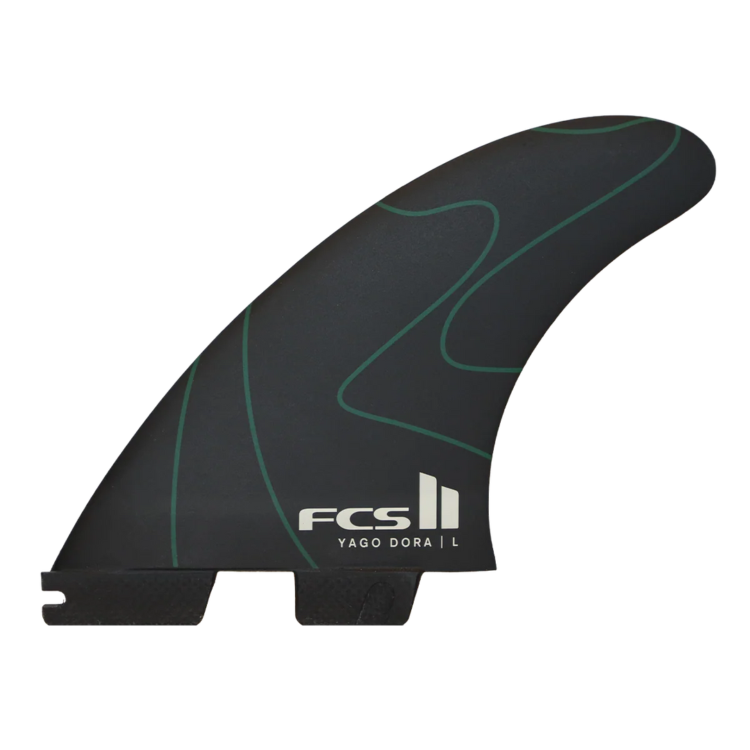 Black and green surf fin with FCS logo on a white background