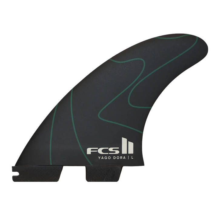 Black and green surf fin with FCS logo on a white background