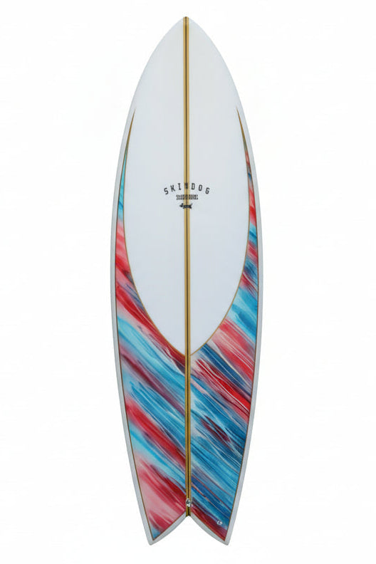 Colorful surfboard with geometric pattern leaning against a white background.